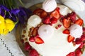 Still-life with cake with whipped cream, strawberry and  marshmallow Royalty Free Stock Photo