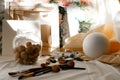 Still life with canvases, paints and peanuts Royalty Free Stock Photo
