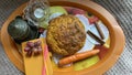 Still life of carrot cake, grapes, a cup of Turkish coffee, candles, cinnamon, notebook, and pens Royalty Free Stock Photo