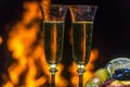 Still life with champagne on the background of fire Royalty Free Stock Photo