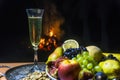 Still life with champagne on the background of fire Royalty Free Stock Photo