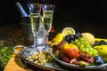 Still life with champagne on the background of fire Royalty Free Stock Photo