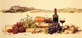 Still life with cheese, nuts and wine against the backdrop of Italian vineyards Royalty Free Stock Photo