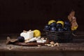 Still life with cheese, quince and ripe plums Royalty Free Stock Photo