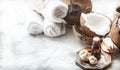 Still life with coconut oil in a bottle and fresh coconut Royalty Free Stock Photo