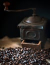 Still life with coffee beans and an old coffee grinder. Dark still life - Image Royalty Free Stock Photo