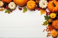 Still life composition featuring pumpkins and autumn leaves arranged on a clean white background Royalty Free Stock Photo