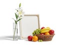 A still life composition with fresh fruit, a white lily, and a blank canvas Royalty Free Stock Photo