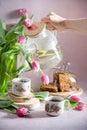 Still life, concept of early spring breakfast with coffee or tea and cupcake Royalty Free Stock Photo