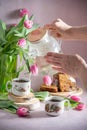 Still life, concept of early spring breakfast with coffee or tea and cupcake Royalty Free Stock Photo