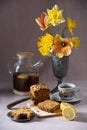 Still life, concept of early spring breakfast with coffee or tea and cupcake Royalty Free Stock Photo