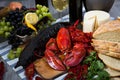 Still life with cooking marine products, wine and cheese Royalty Free Stock Photo