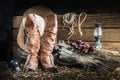 Still life with cowboy hat and traditional leather boots Royalty Free Stock Photo