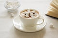 Still life with a Cup of coffee, marshmallow and a book. The concept of morning mood. Royalty Free Stock Photo