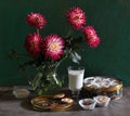 Still life with dahlias, thin captain and milk Royalty Free Stock Photo