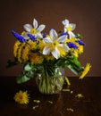 Still life with dandelions and daffodils Royalty Free Stock Photo