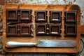 Still life with dark chocolate on a wooden board Royalty Free Stock Photo