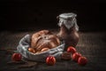 still life earthenware jug of milk on a table with drapery, bread, eggs and apples, rural food Royalty Free Stock Photo