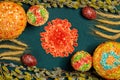 Still life of Easter dishes on a green background during quarantine with a coronavirus bacterium