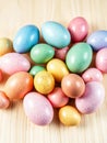 A Still Life of Easter Eggs in Assorted Hues and Textures, Placed on a Light Wood Grain Background. Royalty Free Stock Photo