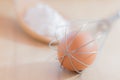 Still life egg in whisk. Royalty Free Stock Photo