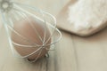 Still life egg in whisk. Royalty Free Stock Photo