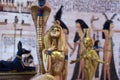 Egyptian figures cleopatra snake anubis and eset Royalty Free Stock Photo