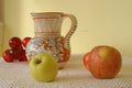 Still life with enamel vintage jug and fresh apples