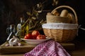 Still life with extra virgin olive oil, tomatoes, garlic and bread Royalty Free Stock Photo