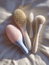 Still Life Featuring Assorted Grooming Tools Displayed on a Textured White Fabric Surface Royalty Free Stock Photo