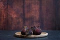 still life figs on a wooden plate Royalty Free Stock Photo