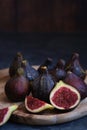 still life figs on a wooden plate Royalty Free Stock Photo