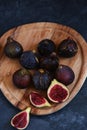 still life figs on a wooden plate Royalty Free Stock Photo