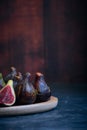 still life figs on a wooden plate Royalty Free Stock Photo