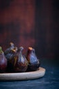 still life figs on a wooden plate Royalty Free Stock Photo