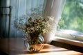 Still life flowers on the table in the morning. Enterior