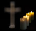 Still life with four candles cross in the background. Royalty Free Stock Photo