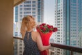 Still life fragments of the landscape design of the flower alley with an elegant girl. Travel among floral arrangements