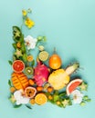 Still life with fresh assorted exotic fruits and flowers Royalty Free Stock Photo