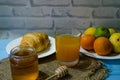 Still life with fresh fruits and glass of juice on the wooden background Royalty Free Stock Photo