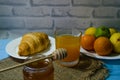 Still life with fresh fruits and glass of juice on the wooden background Royalty Free Stock Photo