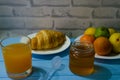 Still life with fresh fruits and glass of juice on the wooden background Royalty Free Stock Photo