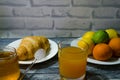 Still life with fresh fruits and glass of juice on the wooden background Royalty Free Stock Photo