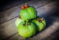 Still life with fresh garcinia cambogia on wooden background (Thai herb)