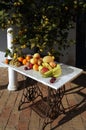 Still life of fruit with sunlight outside, Royalty Free Stock Photo
