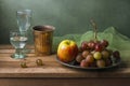 Still life with fruits and glasses of water Royalty Free Stock Photo