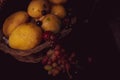 Still life with fruits grapes and pears in the basket Royalty Free Stock Photo