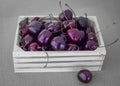 Still life with fruits - small crate with cherries.