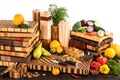 Still life with fruits, vegetables, nuts and candied fruits with cutting boards Royalty Free Stock Photo