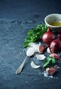 Still life with garlic, onion, parsley and sea salt Royalty Free Stock Photo